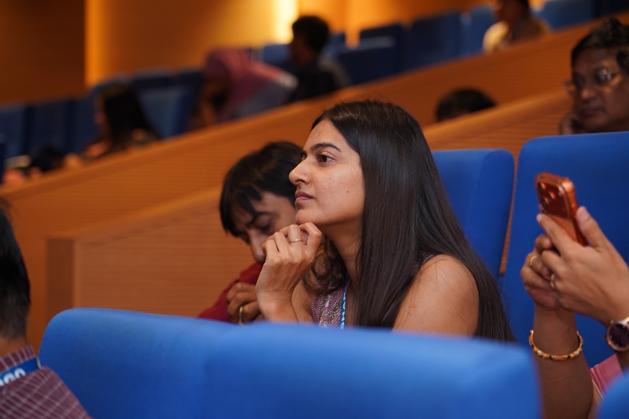 A participant listens to a session at the Third National School Health Conference 2026.