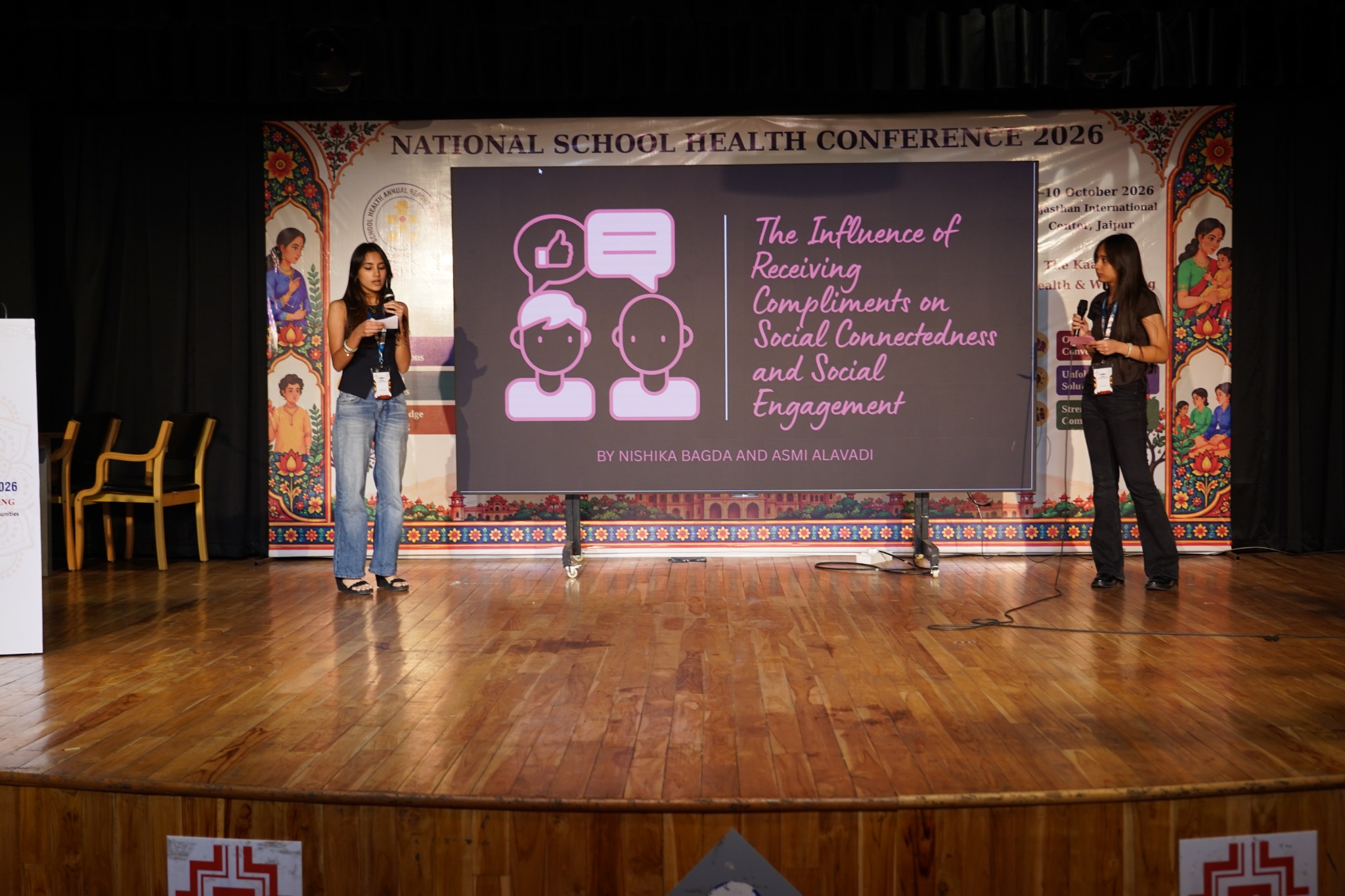 Students present their study on how receiving compliments influences social connectedness and social engagement.